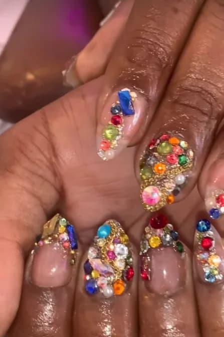Nail tech painting a fresh set