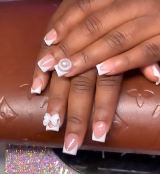 White French tips with 3D flower accents